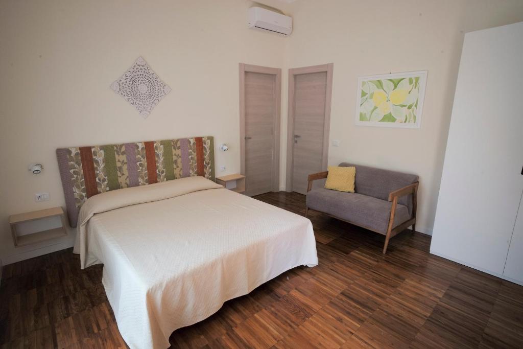 Fiordarancio Room Rental Hotel Włochy sypialnia