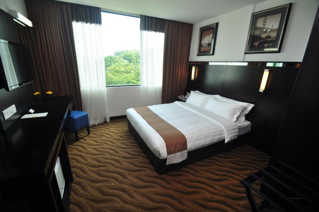 Dreamtel Kota Kinabalu Hotel Borneo sypialnia